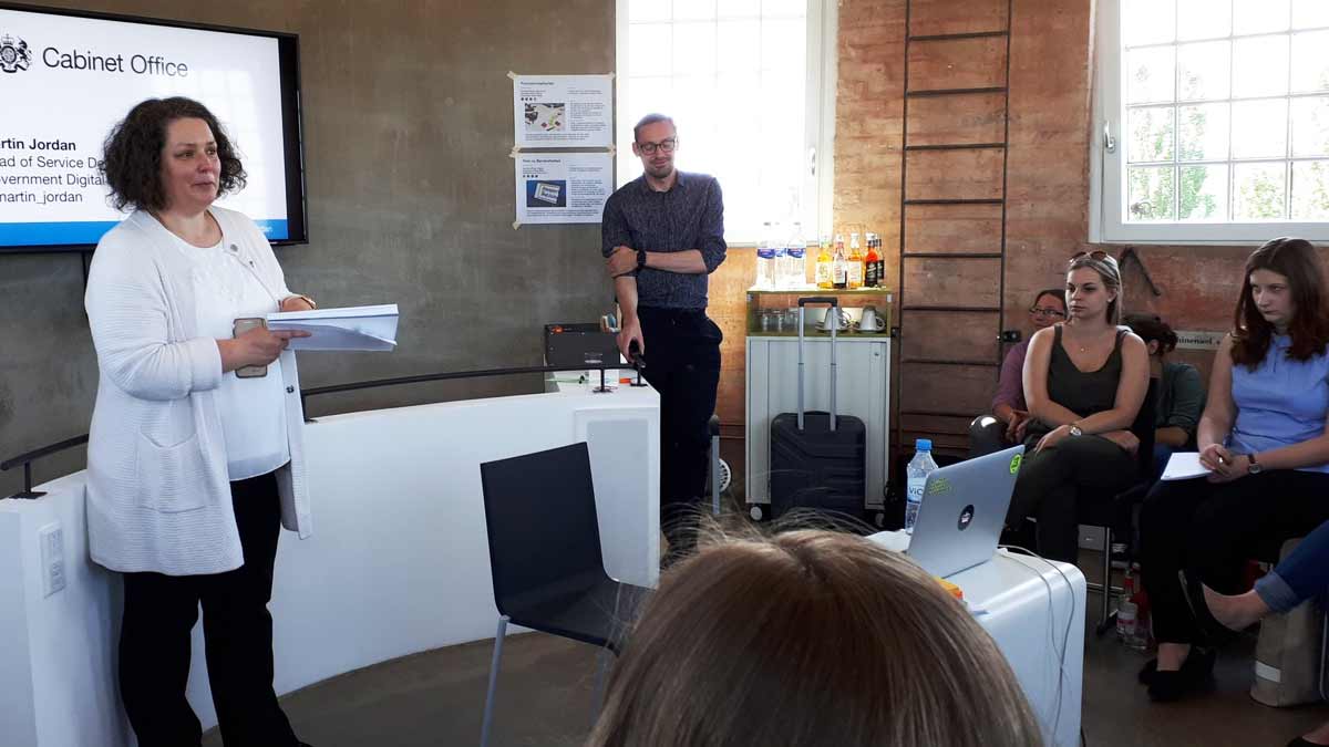 Martin Jordan being introduced to public adminstration students by professor Dr Ines Mergel